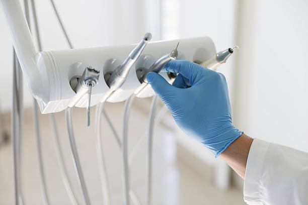 Professional Tooth Extraction technician working in Jackson, MS